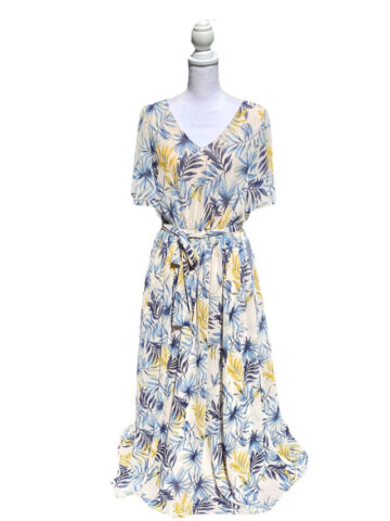 maxi dress with palm leaves on a white mannequin