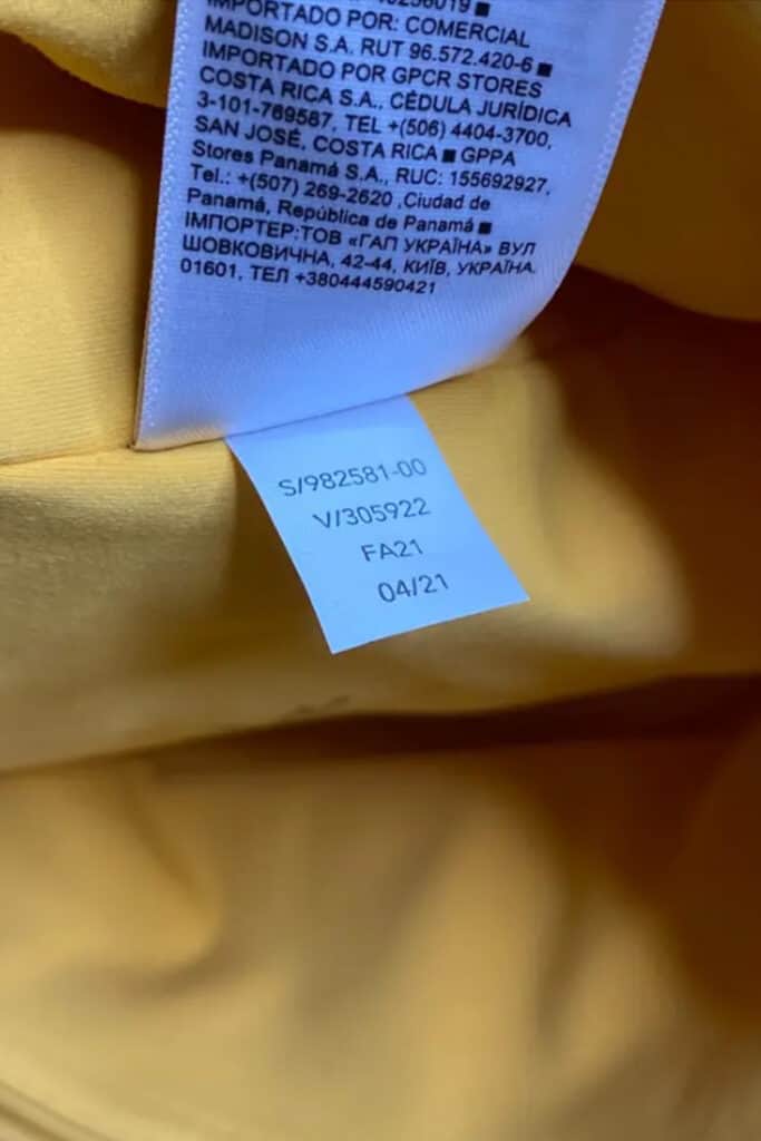 close up of the style number tag on yellow athleta leggings.