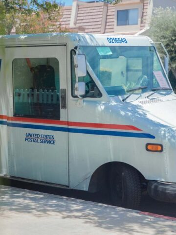 a united states postal service mail truck.