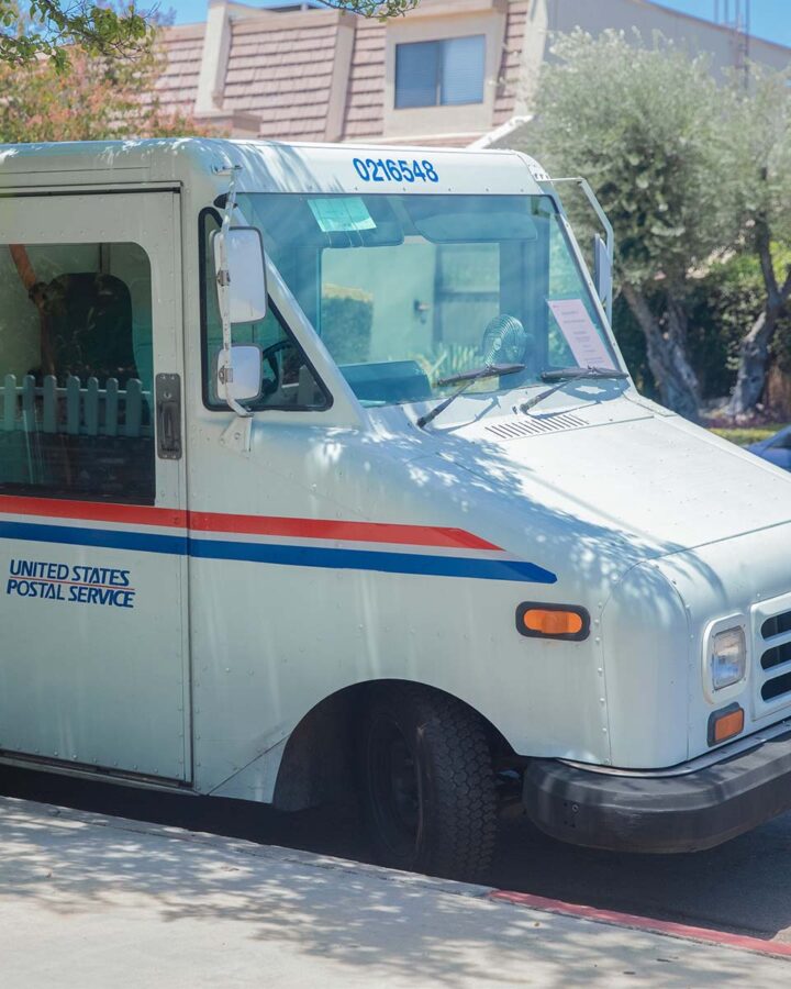 a united states postal service mail truck.