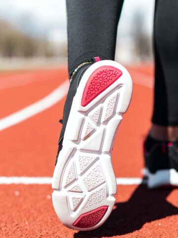 white and pink outsole of a running shoe.