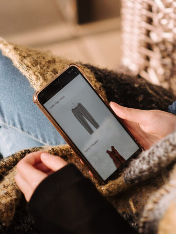 person on a phone with a pair of pants on the screen.