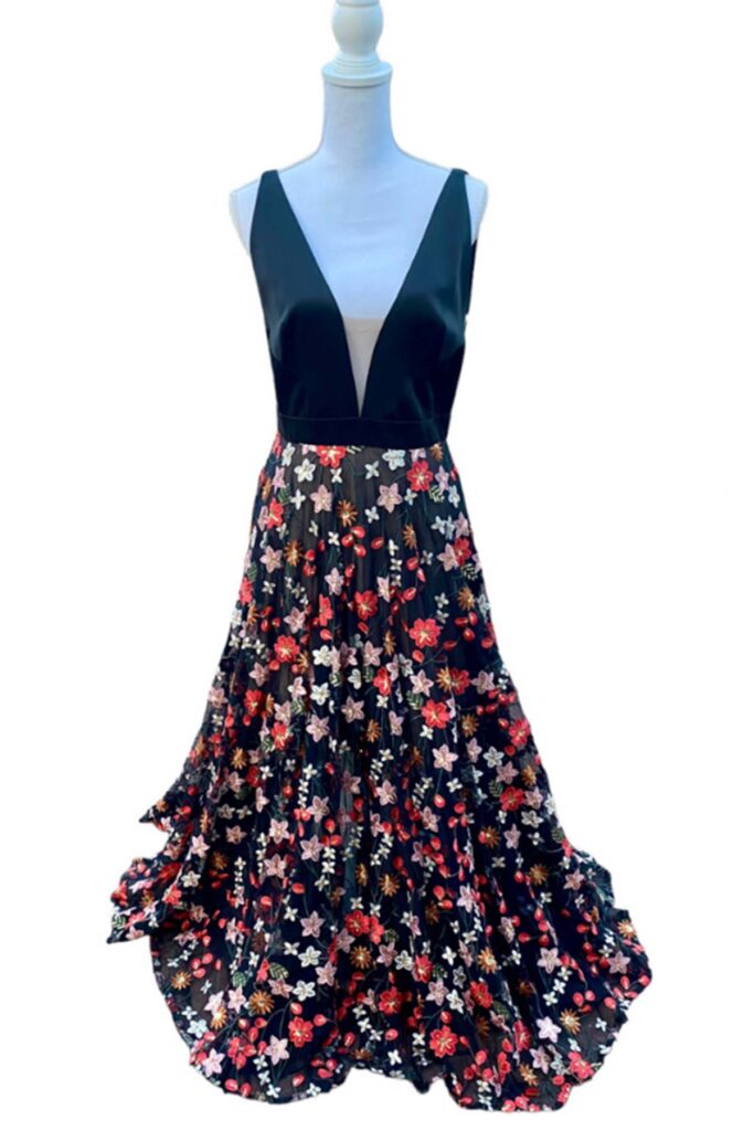 a picture of a floral maxi dress on a mannequin.