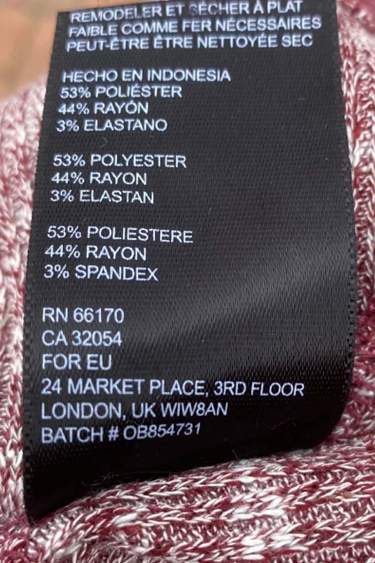 an urban outfitters care tag with the style number.