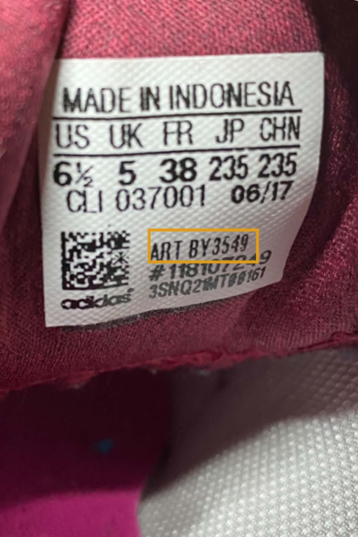 close up of an adidas style number tag.