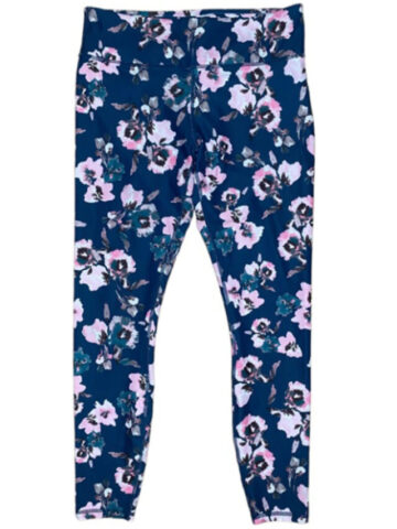a pair of floral fabletics leggings laid flat on a white background.