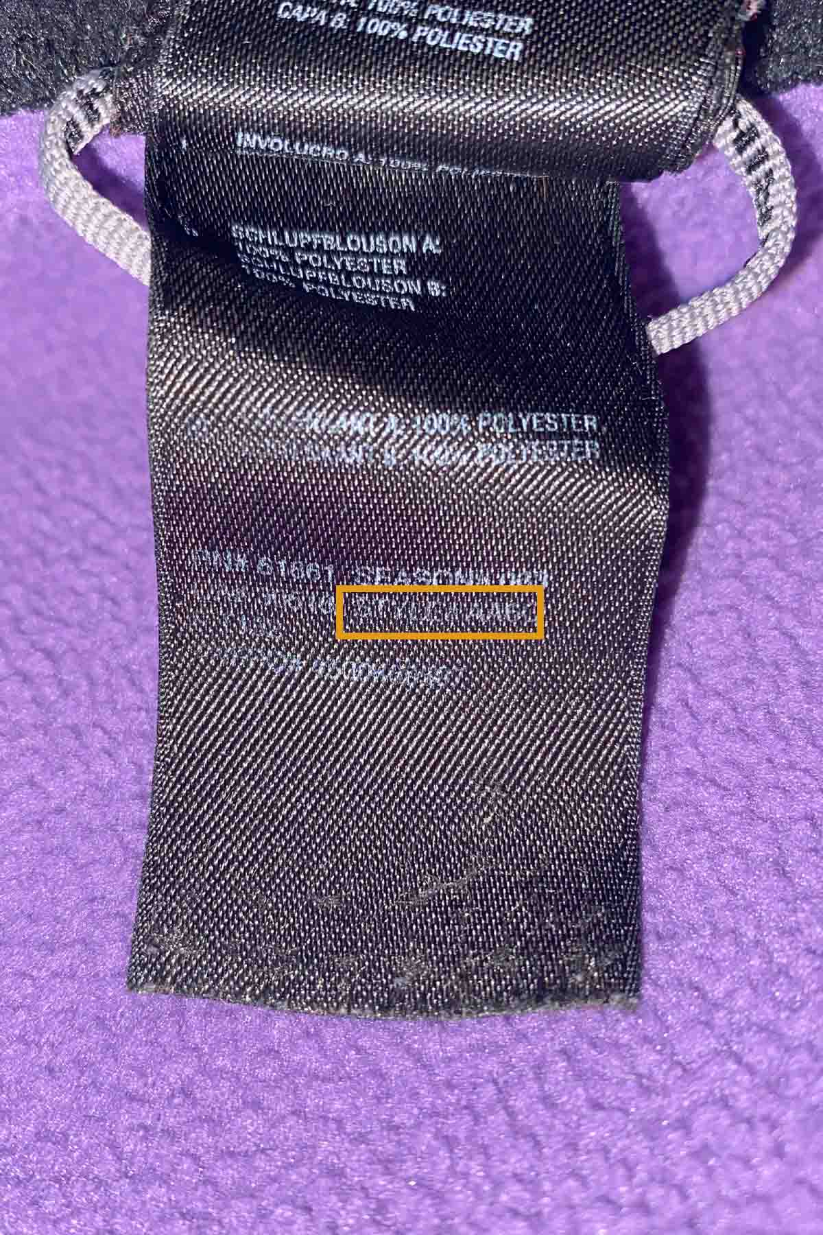 close up of a north face brand tag showing the style number.