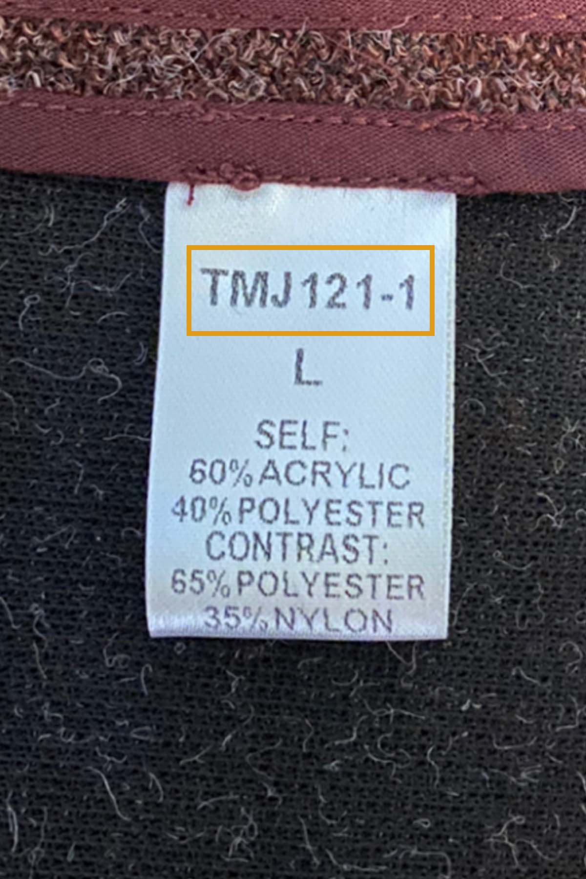 close up of an anthropologie THML style number tag.
