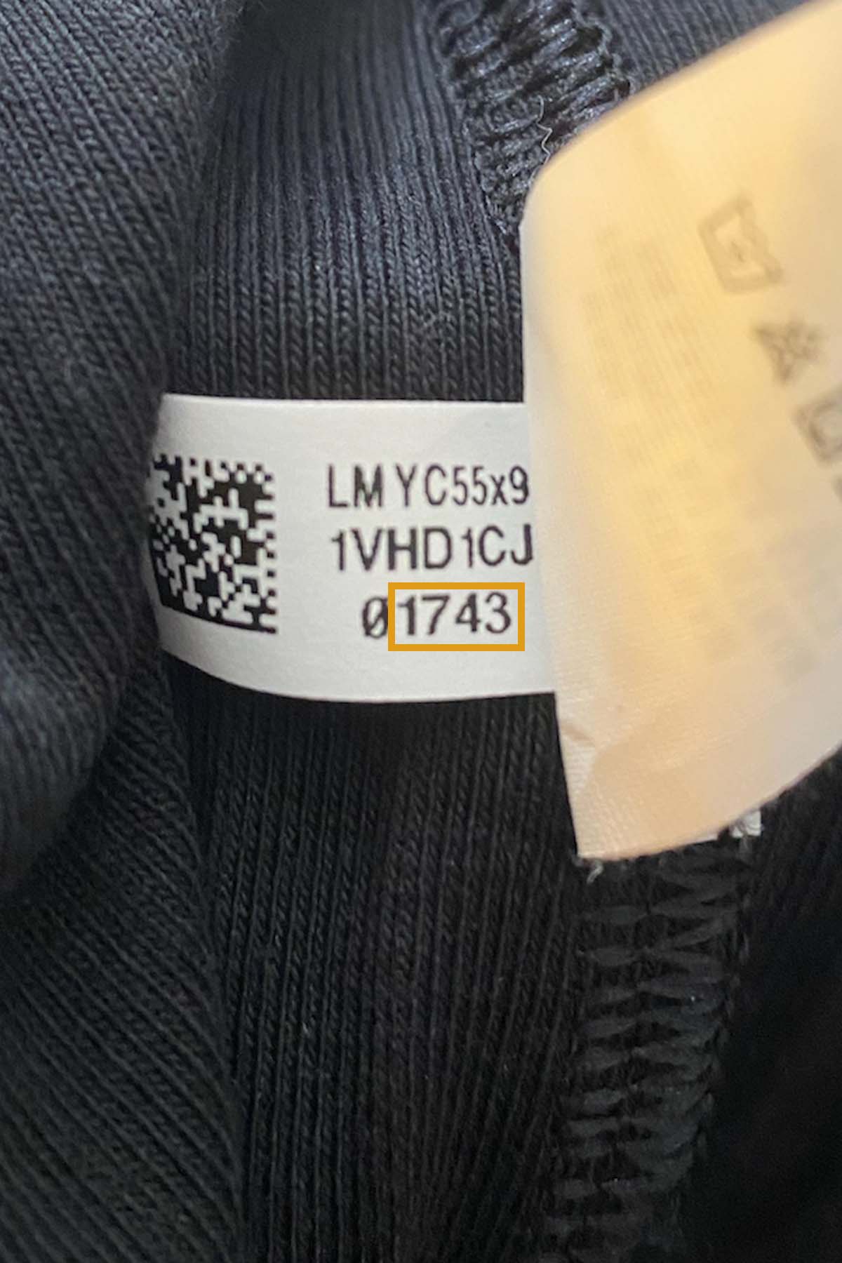 close up of an inside tag of an aerie dress showing the style number.