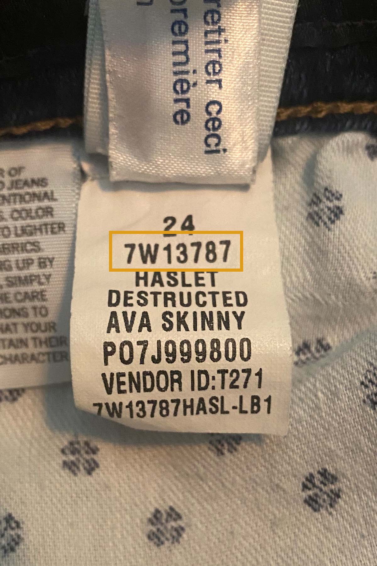 close up of a lucky brand style number tag.