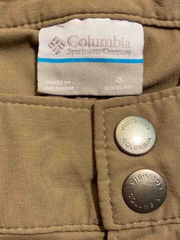 close up of a columbia size tag on a pair of khaki pants.